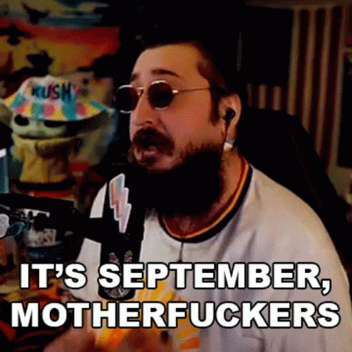 Bearded Man With Sunglasses and Earbuds Says It's September Motherfuckers