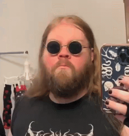 Bearded Man with Sunglasses Taking Selfie