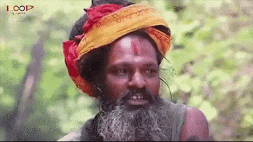 Bearded Man With Turban And Red-Yellow Headband GIF