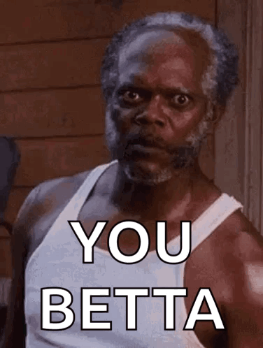 Bearded Mustached Man in White Tank Top Saying You Betta