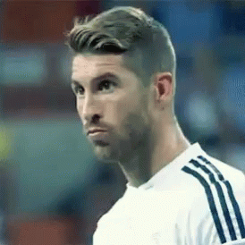 Bearded Soccer Player in White Adidas Jersey