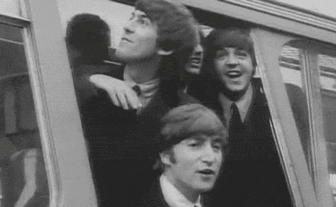 Beatles Riding Bus Looking Out Window