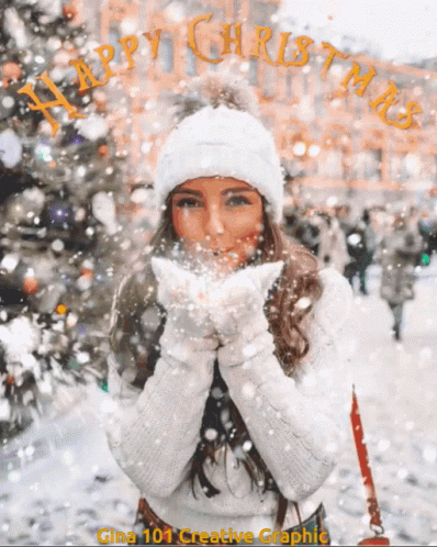 Beautiful Christmas Girl Blowing Snow GIF