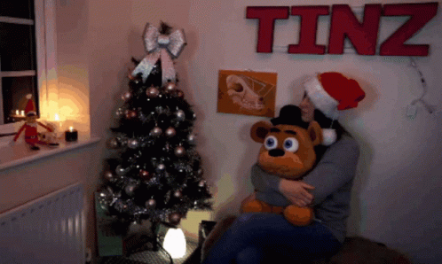 Beautiful Christmas Watching The Tree Hugging Bear GIF