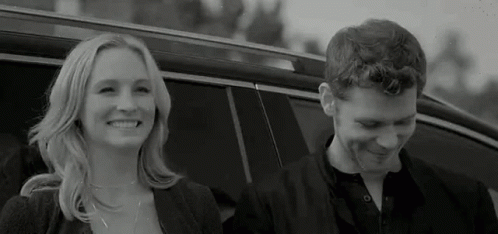 Beautiful Couple Exchanging Maybe So GIF