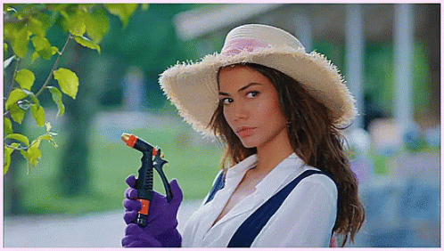 Beautiful Girl Gardening Vines GIF