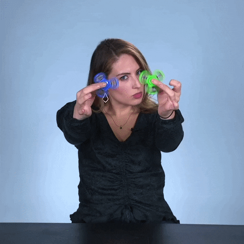 Beautiful Lady Playing Fidget Spinner GIF