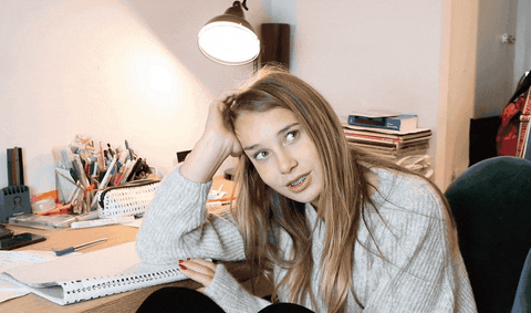 Beautiful Woman Thinking Time To Make The Donuts GIF