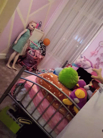 Bedroom With Bed and Stuffed Animals and Barbie Doll