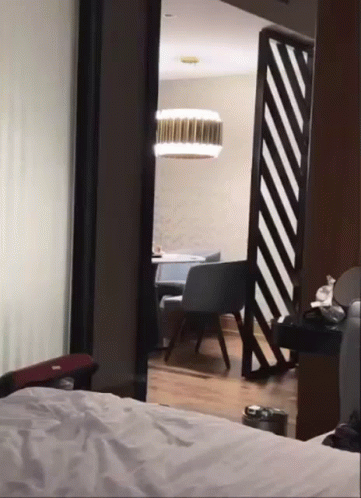 Bedroom with Bed Table and Chairs
