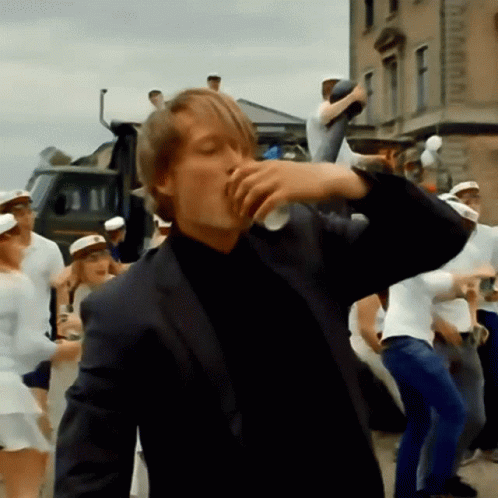 Beerfest Mads Mikelsen Chugging Beer GIF