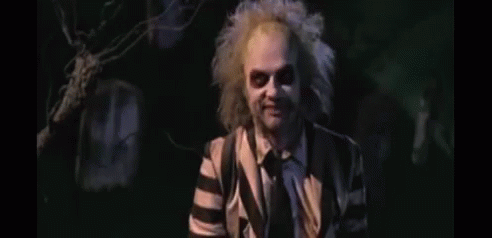 Beetlejuice Meme Fixing Sleeves GIF