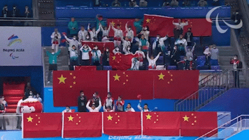 Beijing 2022 Sign Behind Crowd GIF