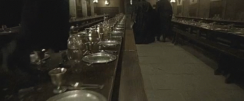 Bellatrix Lestrange Running On Hogwart's Table GIF