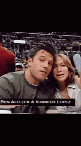 Ben Affleck And Jennifer Lopez Are Posing For A Photo GIF