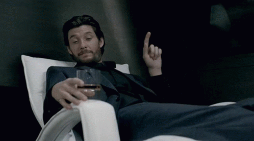 Ben Barnes Relaxing On Bench GIF