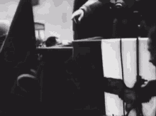 Benito Mussolini Kissing Flag GIF