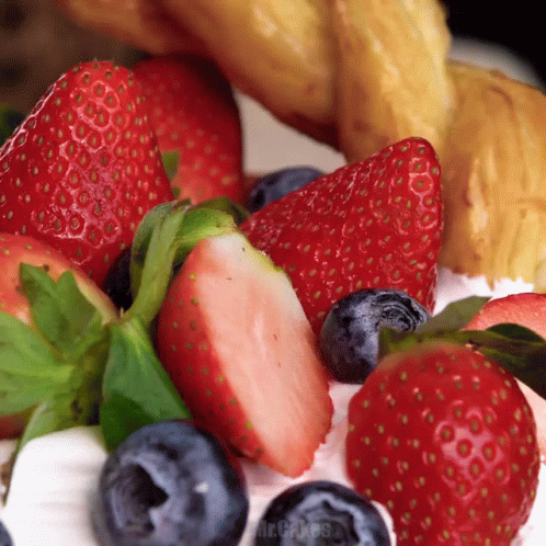 Berries And Cream In Bread Basket GIF