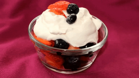Berries And Cream In Glass Bowl GIF