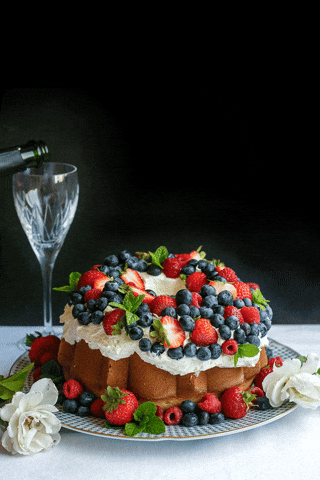 Berries And Cream On Top Of Cake GIF