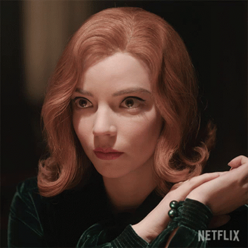 Beth Harmon Demure Smile GIF