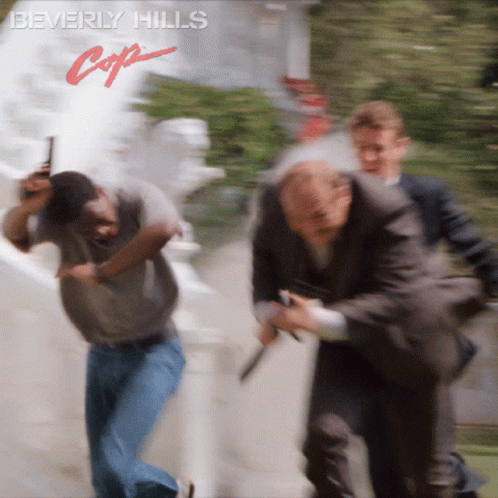 Beverly Hills Cop Axel Dodging Gun GIF