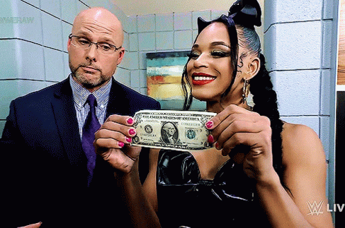Bianca Belair Shows Dollar Bill GIF