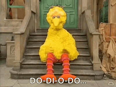 Big Bird Sitting on Stairs