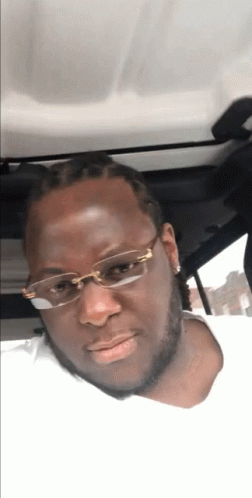 Big Guy Showing Off Big Money In Car GIF