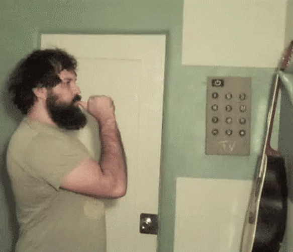 Big Head Man Sucking His Finger GIF