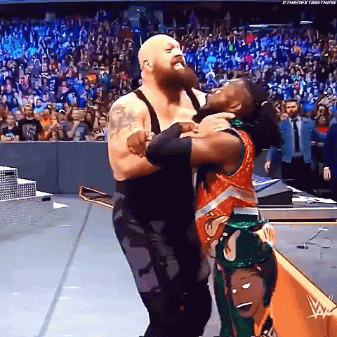 Big Show Chokeslam Kofi Kingston On Announcers Table GIF