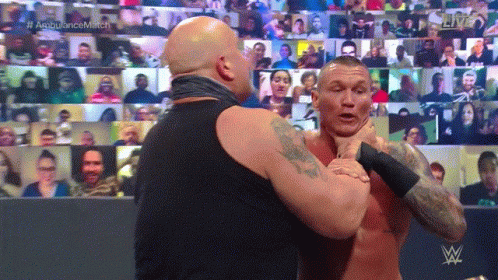 Big Show Chokeslam Randy Orton On Announcers Table GIF