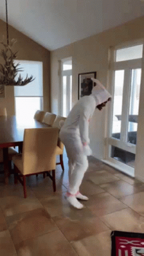 Big White Bunny Dancing In Costume GIF