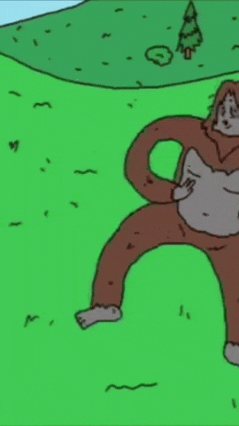 Bigfoot Standing in Grass