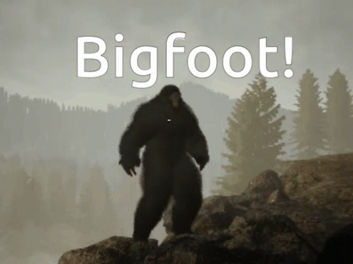 Bigfoot Standing on Rock in Woods