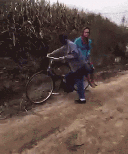 Couple Hilarious Bike Riding Mishap GIF