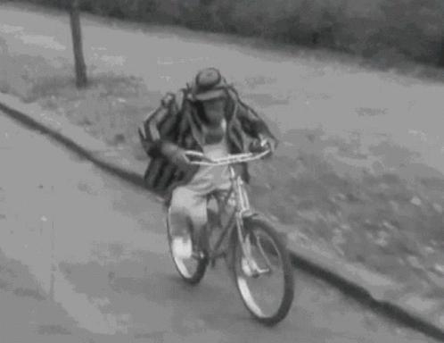 Bike Riding Monkey Vintage Footage GIF