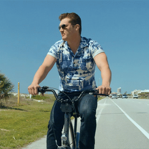 Jon Pardi Relaxed Bike Riding GIF