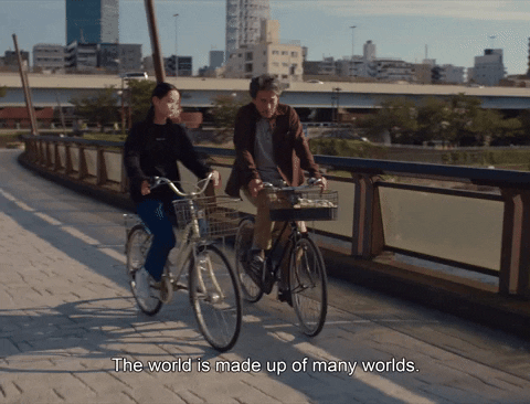 Biking Couple In The Park GIF