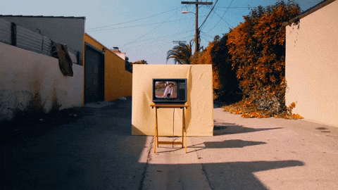 Biking In Vintage Television GIF