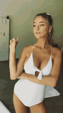 Bikini Model Elizabeth Turner Peace Sign GIF