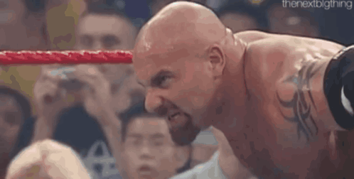 Bill Goldberg Bent Down Burning Eyes GIF