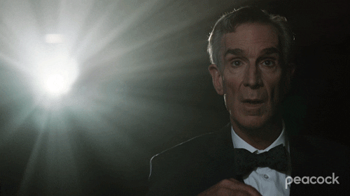 Bill Nye Eating Popcorn While Watching Drama GIF