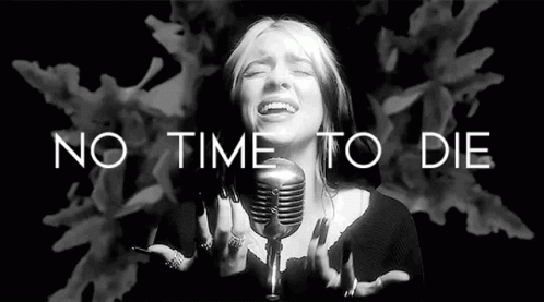 Billie Eilish Is Singing Into A Microphone In A Black And White Photo With The Words `` No Time To Die '' . GIF