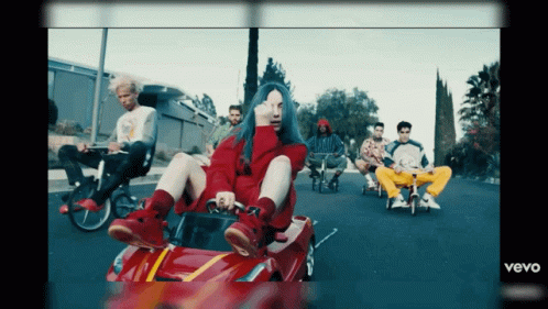 Billie Eilish Sitting In Red Car GIF