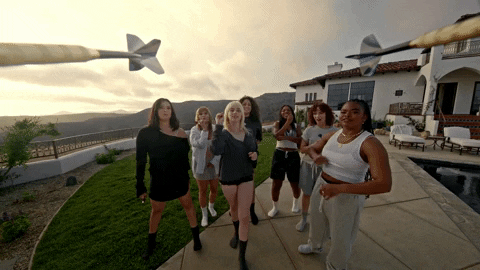 Billie Eilish Playing Darts GIF