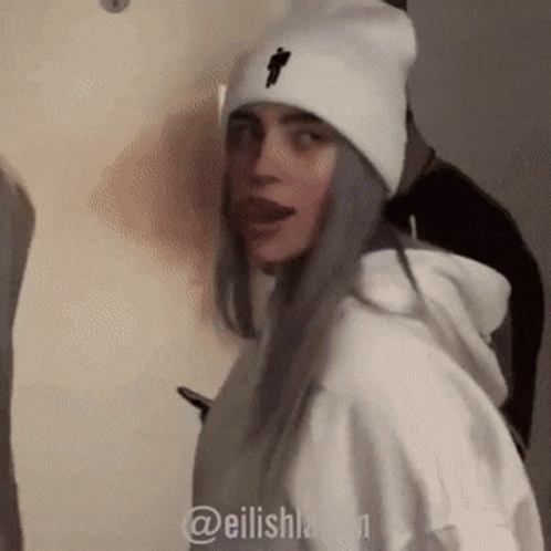 Billie Eilish Wearing White Beanie and Hoodie