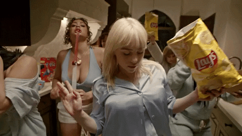 Billie Eillish Holding Chips GIF