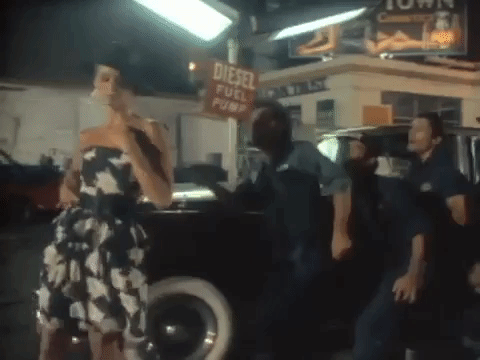 Billy Joel Chasing A Lady Lovestruck GIF