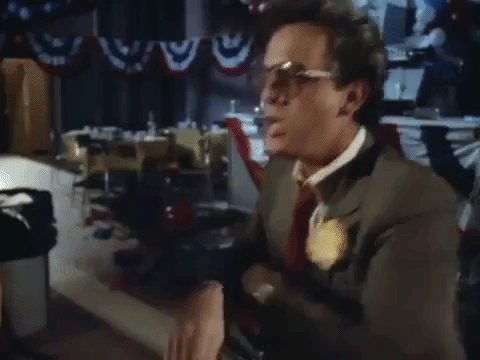 Billy Joel Music Video Taking Off Shades GIF